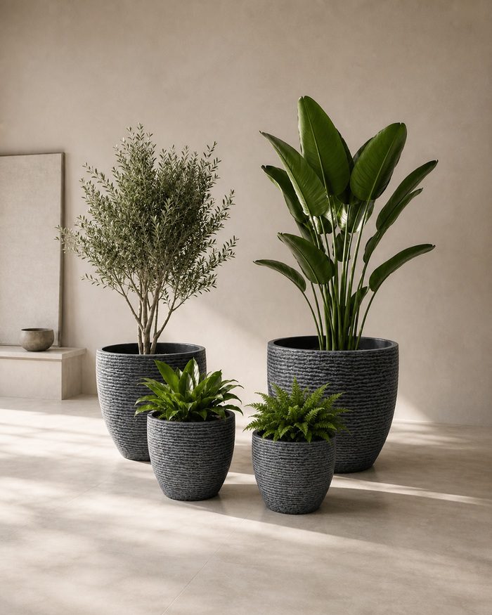 gallery-blue-gray-round-planters-interior Blue gray stone textured round planters styled indoors