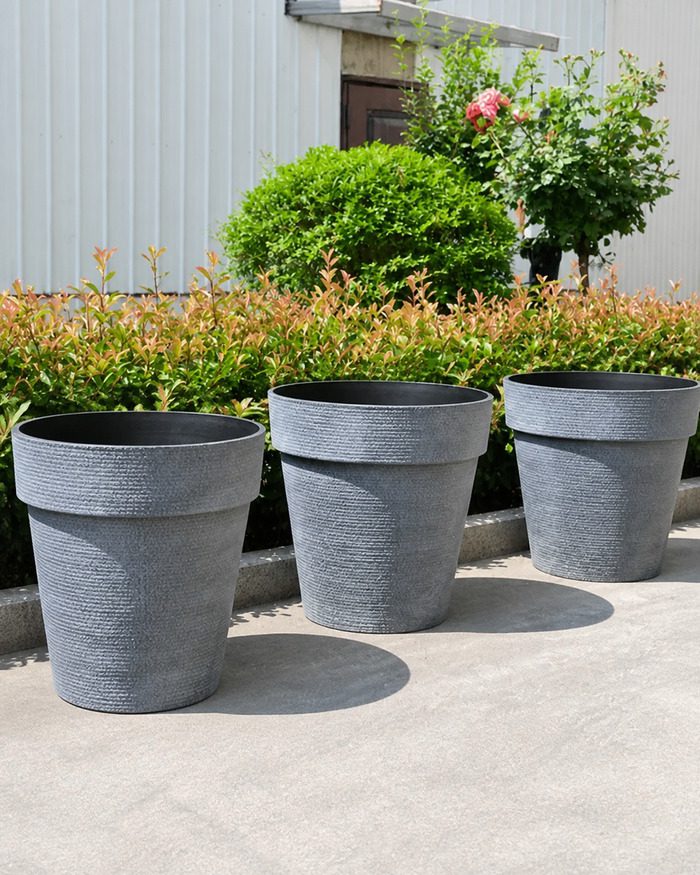 gallery-jumbo-blue-gray-planters-garden Blue Gray jumbo round planters in a landscaped garden
