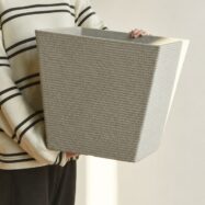 Close view of the lightweight light gray stone textured square planter